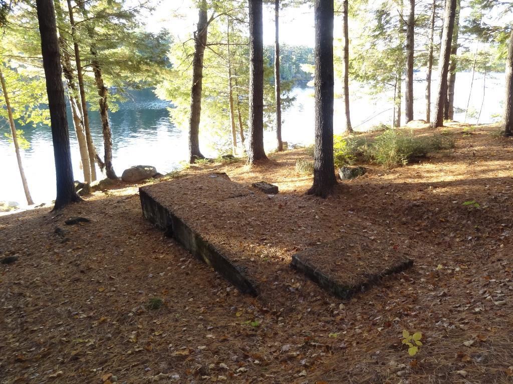 3 Sunrise Point Rd Lake View Milo, ME 04463 - Photo 10 of 15 Concrete pad used to have logs...