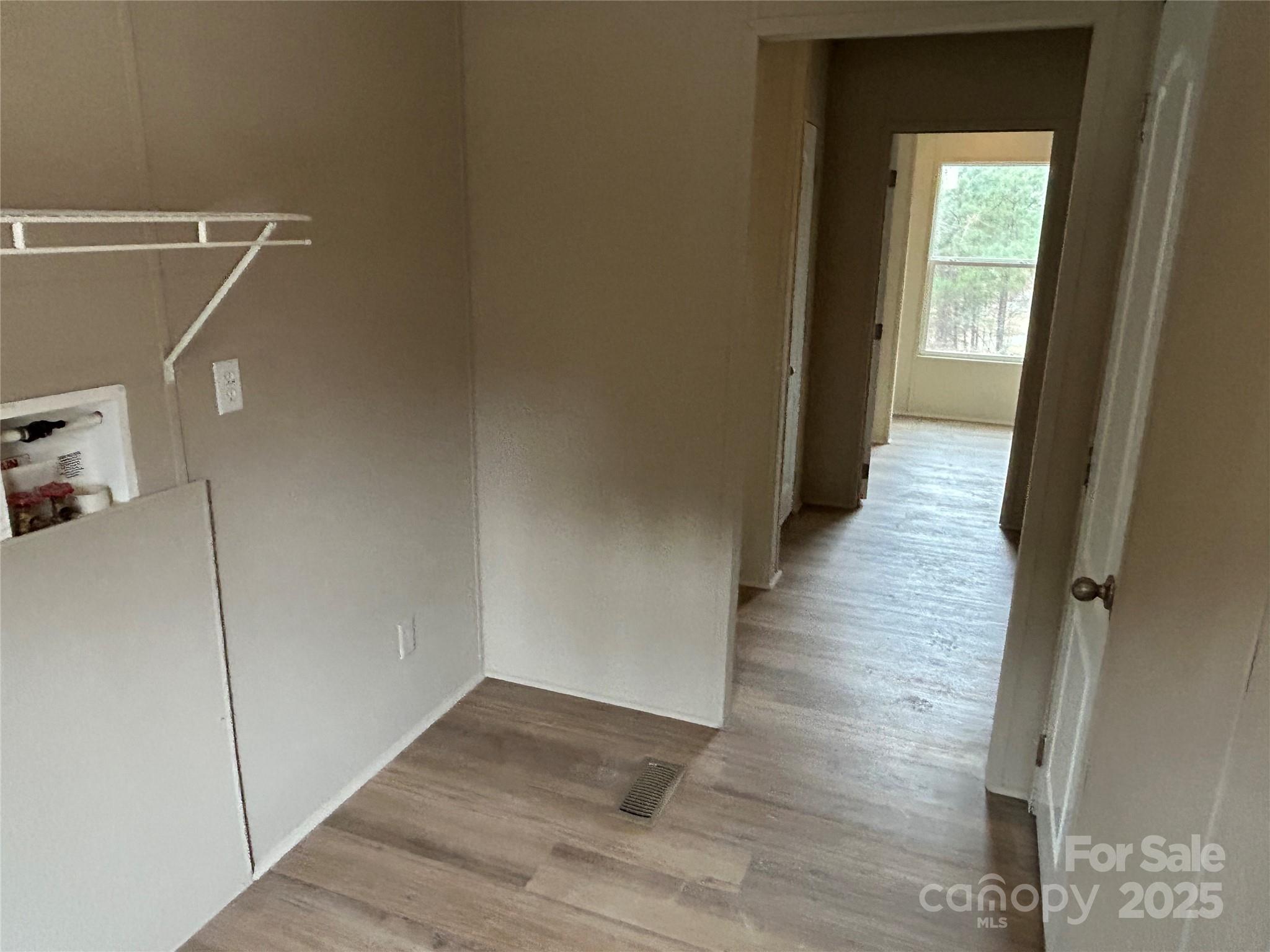 4765 Logging Road Lancaster, SC 29720 - Photo 16 of 19 a view of a hallway with wooden floor