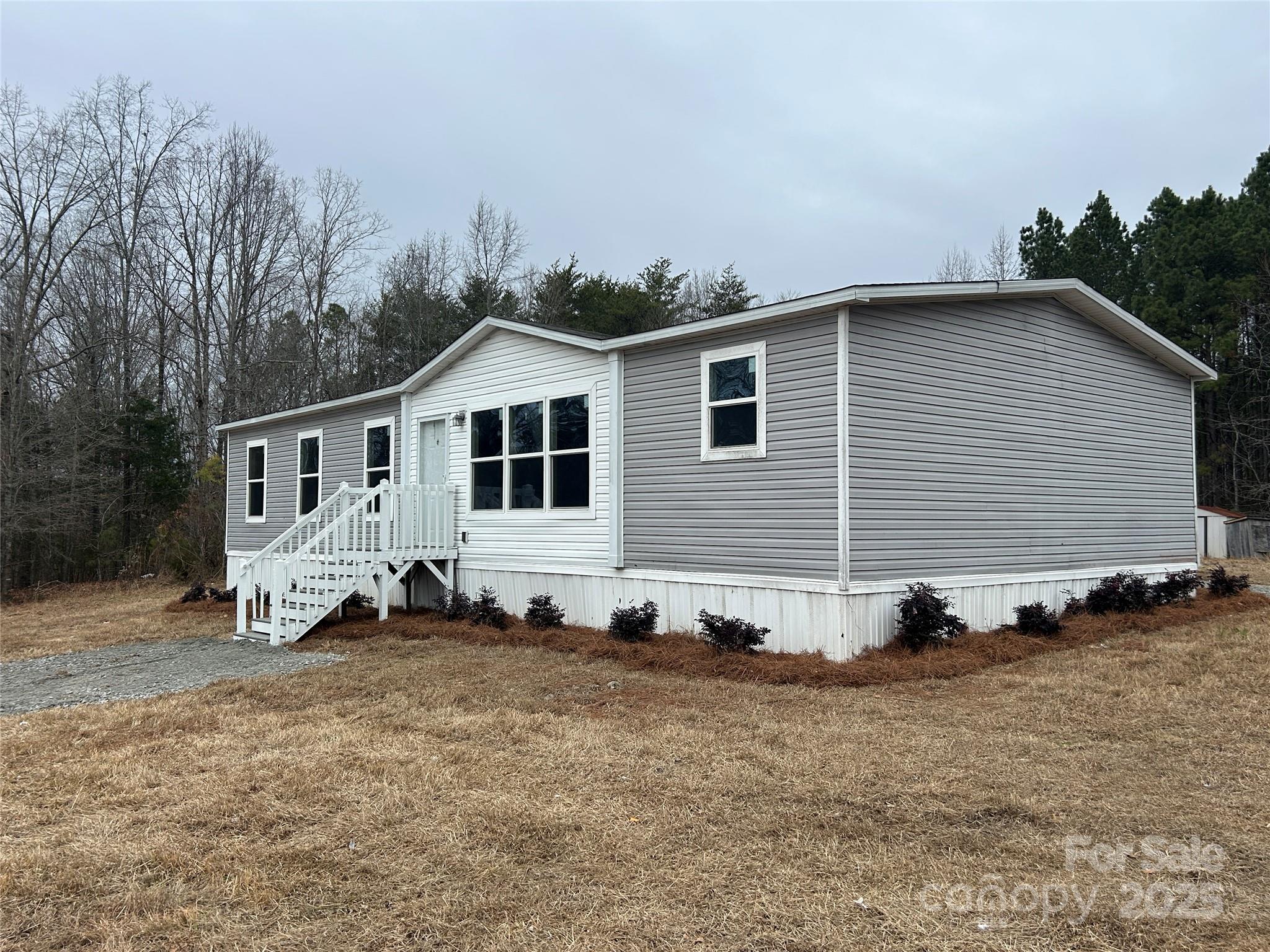 4765 Logging Road Lancaster, SC 29720 - Photo 19 of 19 a view of a house with a yard