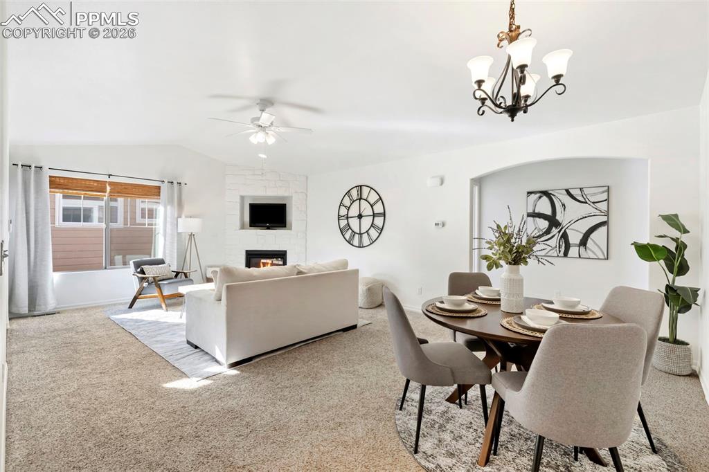 6528 Watusi Road Peyton, CO 80831 - Photo 6 of 27 a living room with furniture and a table