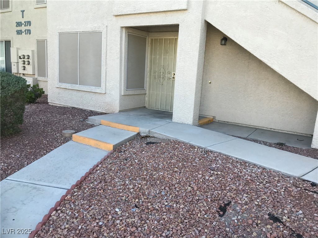 3425 East Russell Road, Unit 170 Las Vegas, NV 89120 - Photo 8 of 13 Entrance to property with stucco siding