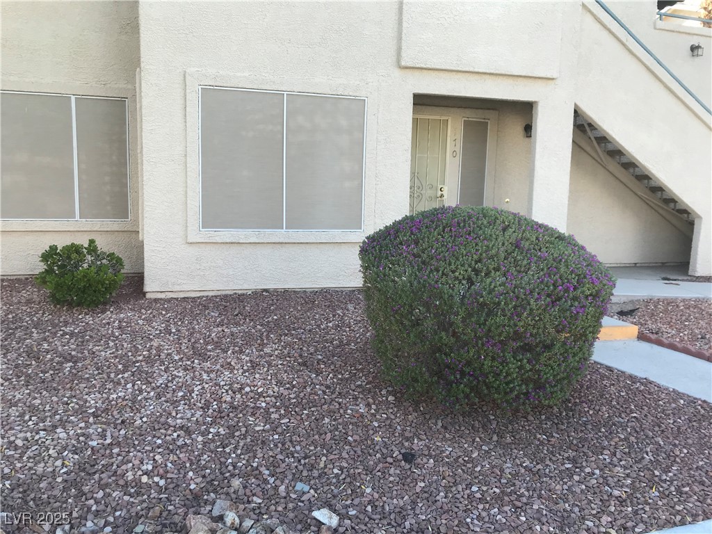 3425 East Russell Road, Unit 170 Las Vegas, NV 89120 - Photo 9 of 13 Entrance to property featuring stucco siding