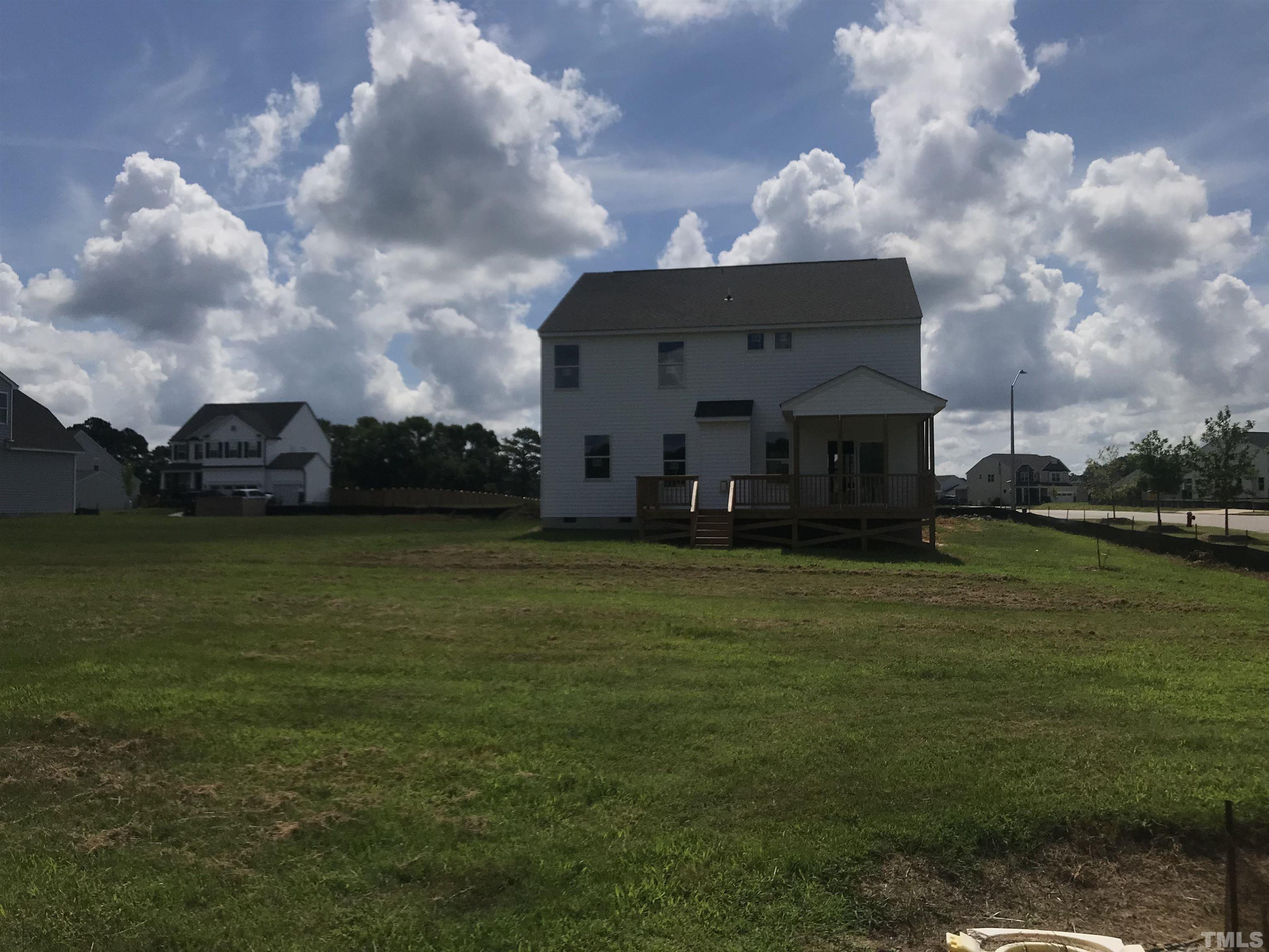 4328 Beckel Road Willow Spring, NC 27592 - Photo 4 of 26 Large lot with ample room for your kids, dogs or just personal space.