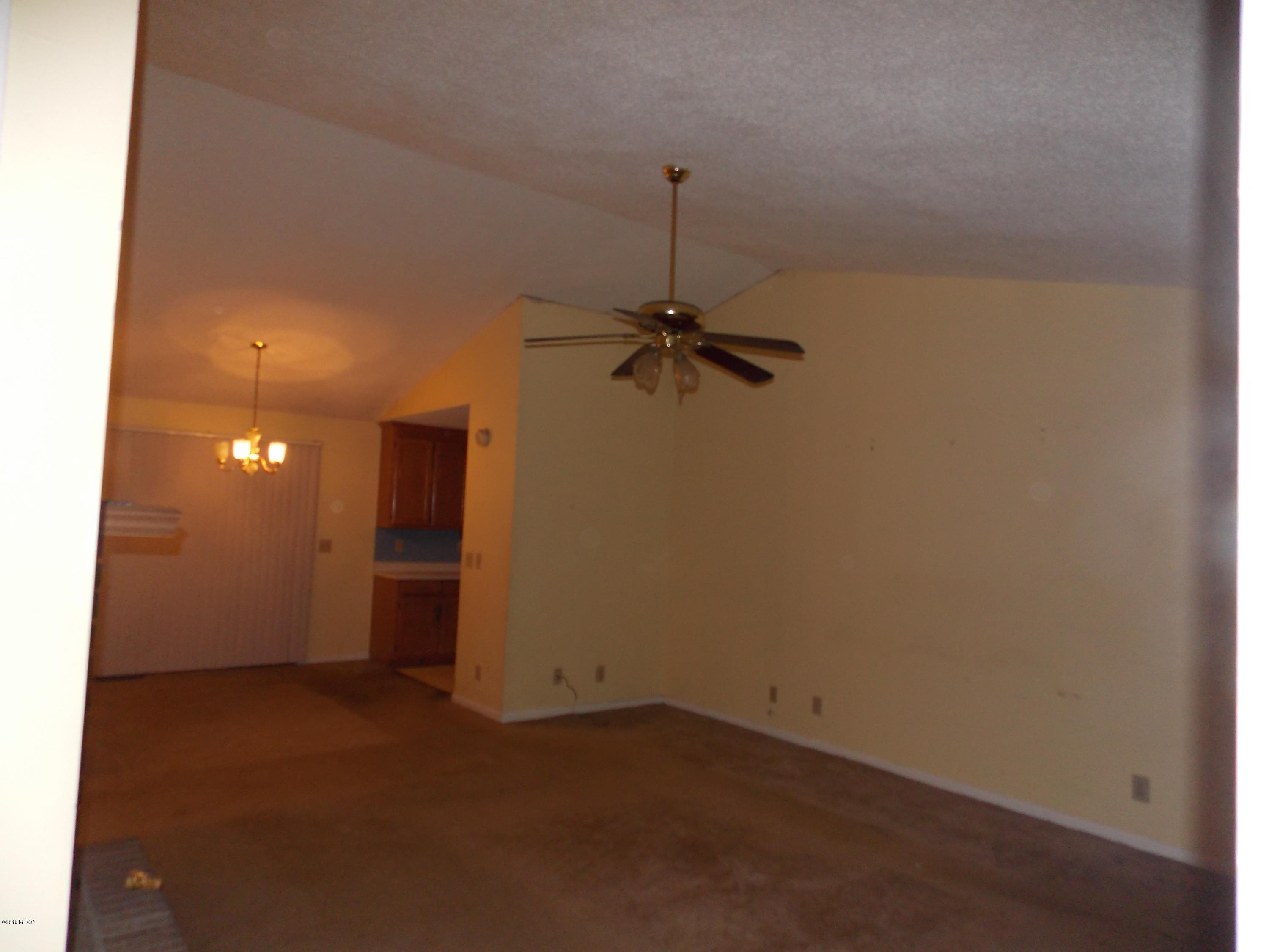 1159 Ridgeview Circle Macon, GA 31220 - Photo 2 of 12 a view of a room with a fan