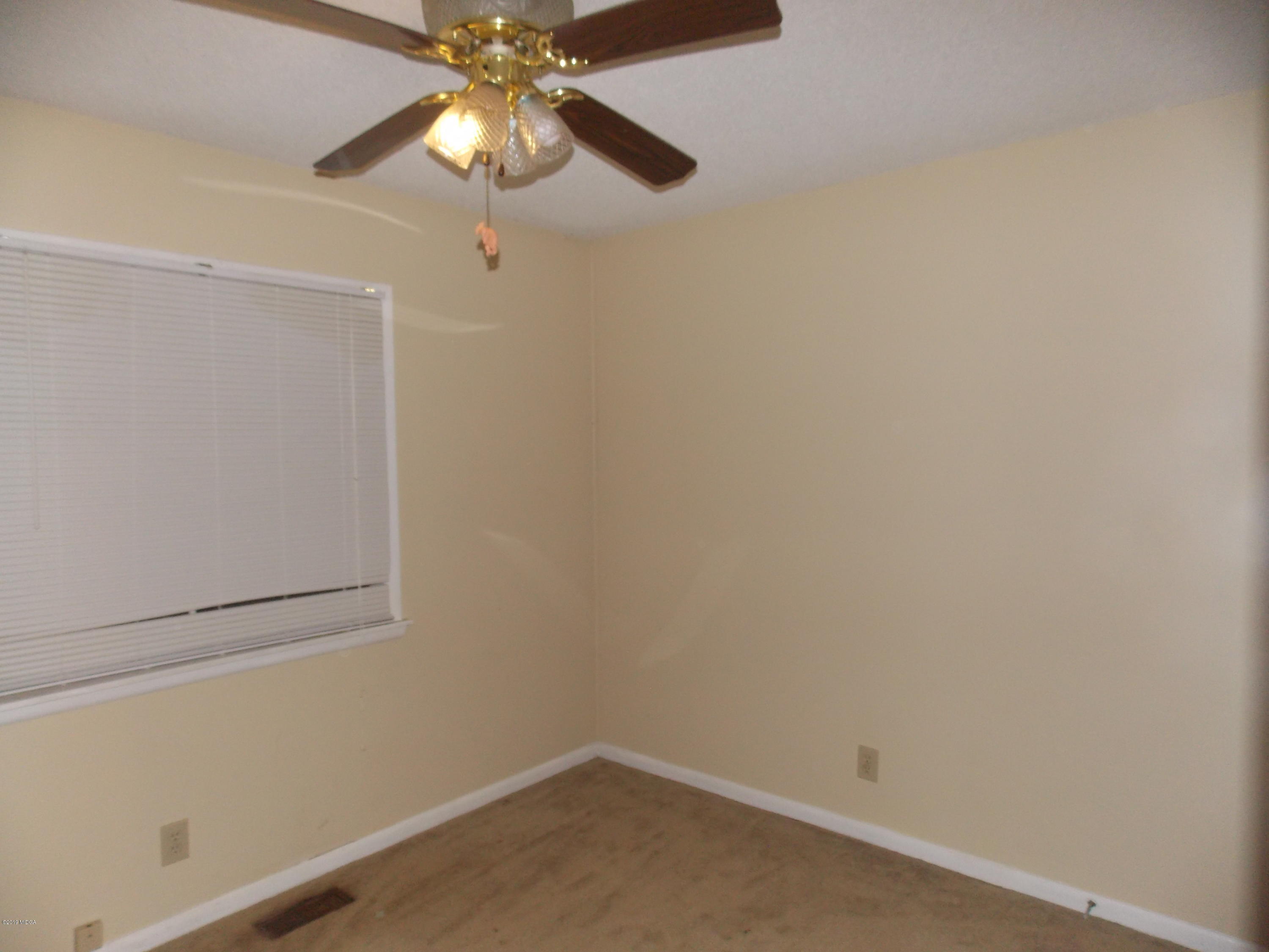 1159 Ridgeview Circle Macon, GA 31220 - Photo 11 of 12 a view of a small space with a fan