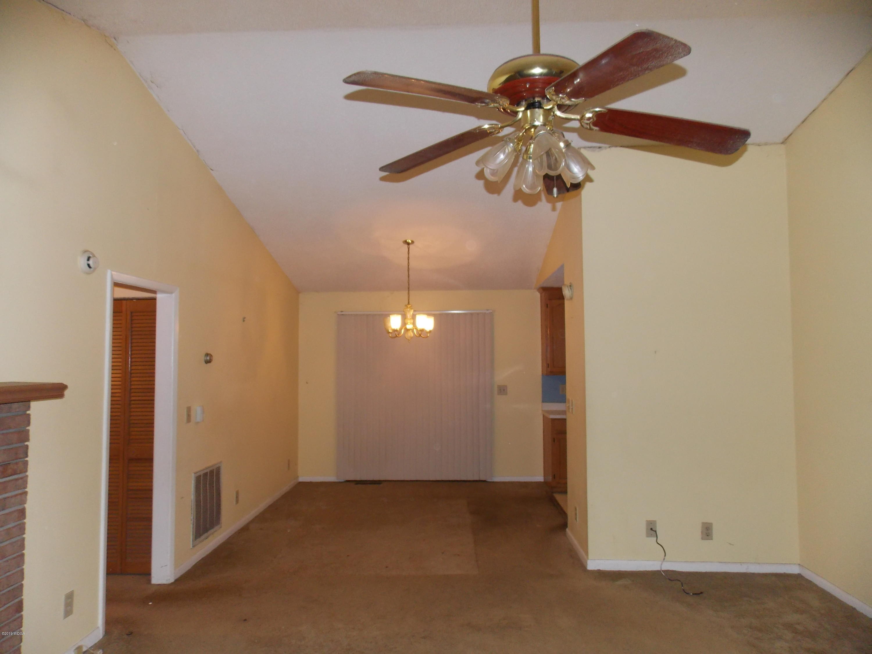 1159 Ridgeview Circle Macon, GA 31220 - Photo 3 of 12 a view of a chandelier fan in a room