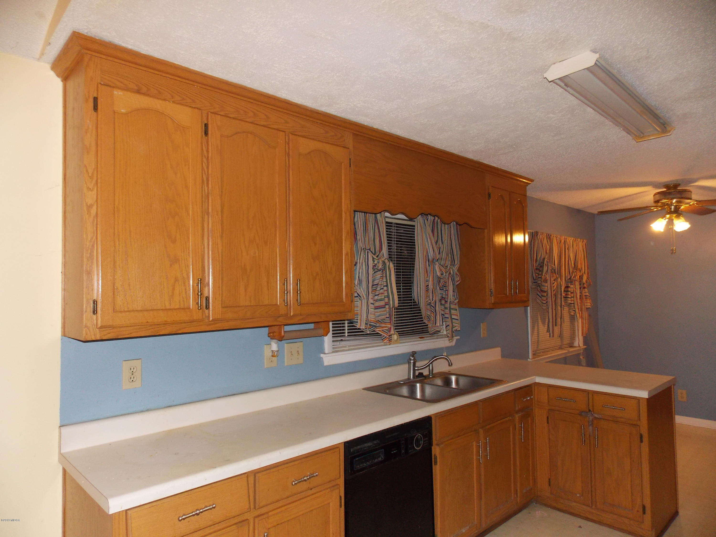 1159 Ridgeview Circle Macon, GA 31220 - Photo 7 of 12 a kitchen with a sink and cabinets