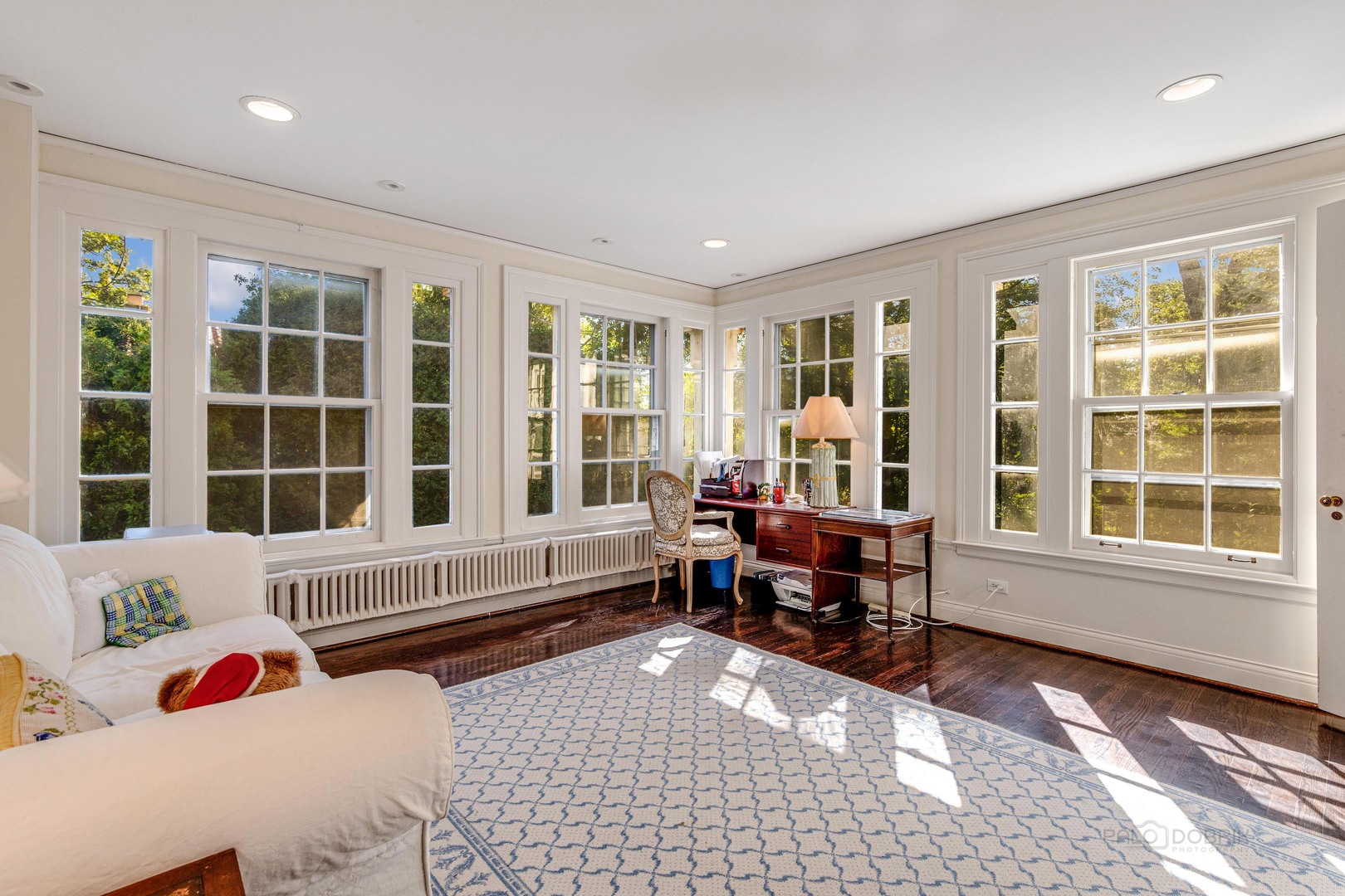620 Spruce Street Winnetka, IL 60093 - Photo 17 of 26 a living room with furniture window and wooden floor
