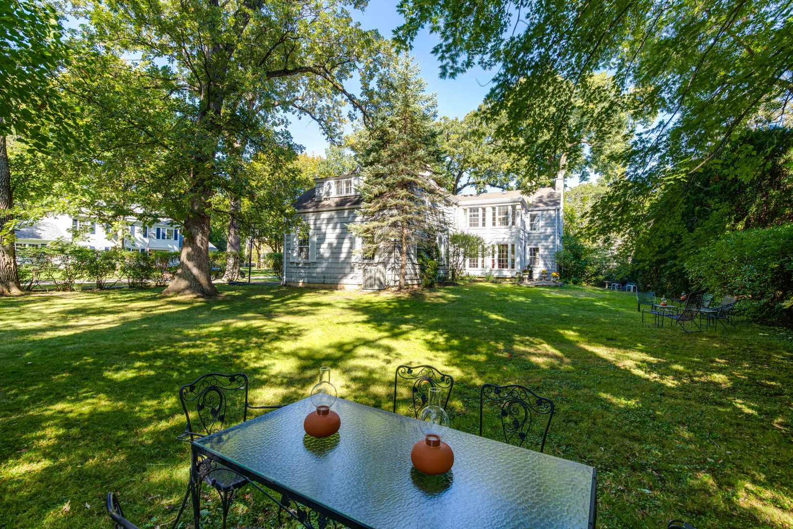 620 Spruce Street Winnetka, IL 60093 - Photo 24 of 26 a view of a yard with chairs
