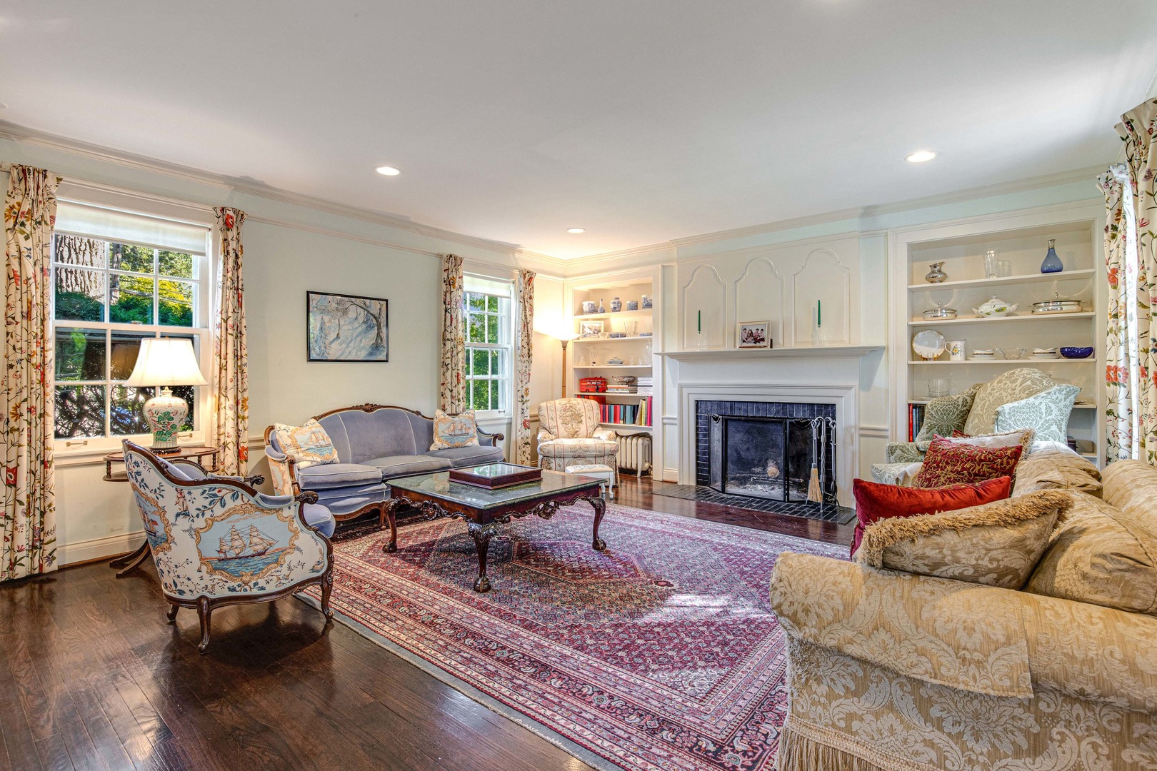 620 Spruce Street Winnetka, IL 60093 - Photo 5 of 26 a living room with furniture and a fireplace