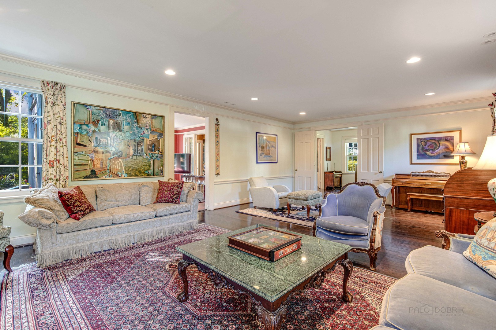 620 Spruce Street Winnetka, IL 60093 - Photo 6 of 26 a living room with furniture a rug and a large window