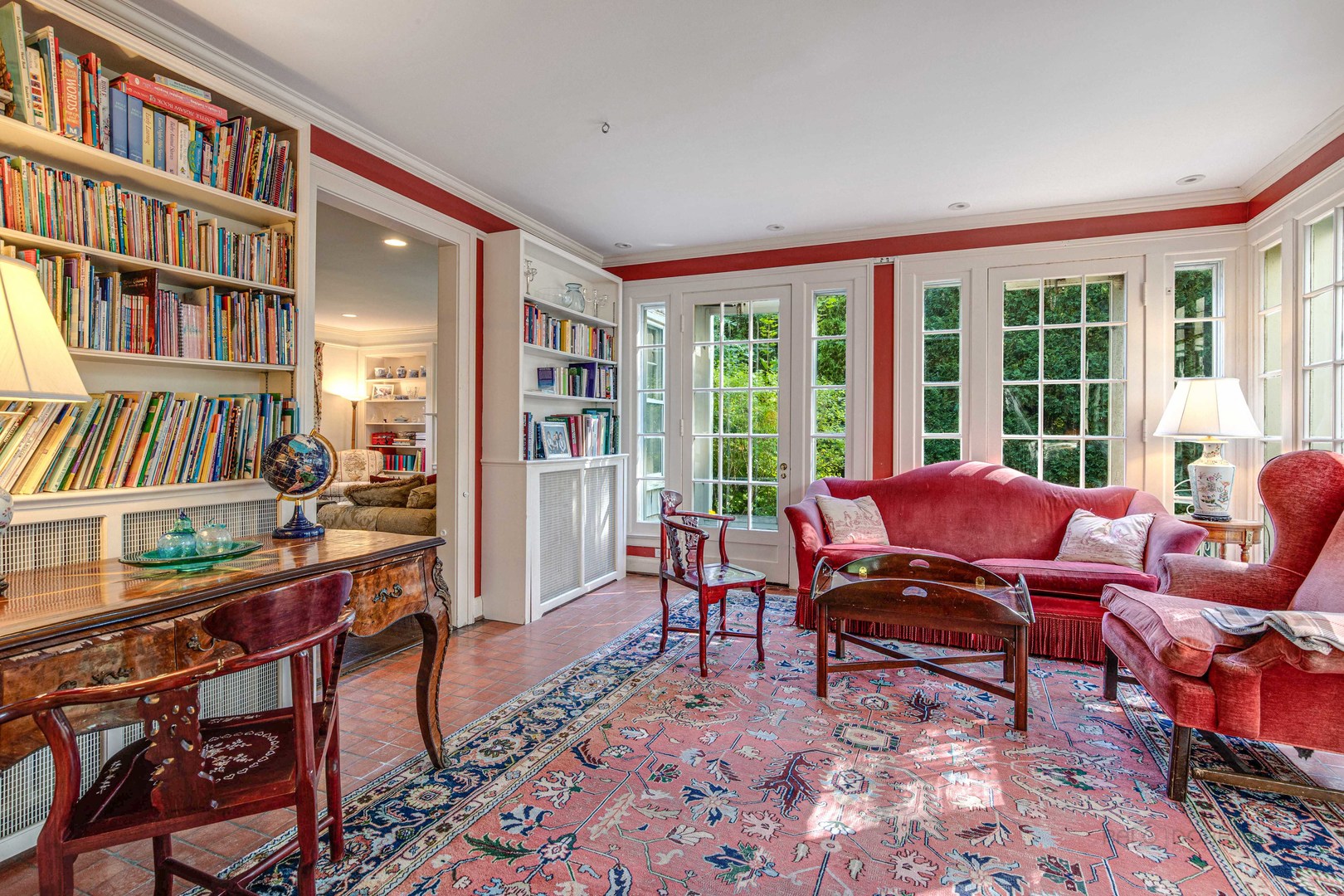 620 Spruce Street Winnetka, IL 60093 - Photo 8 of 26 a living room with furniture and a book shelf