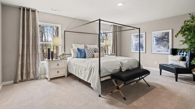 a bed room with a bed and a couch