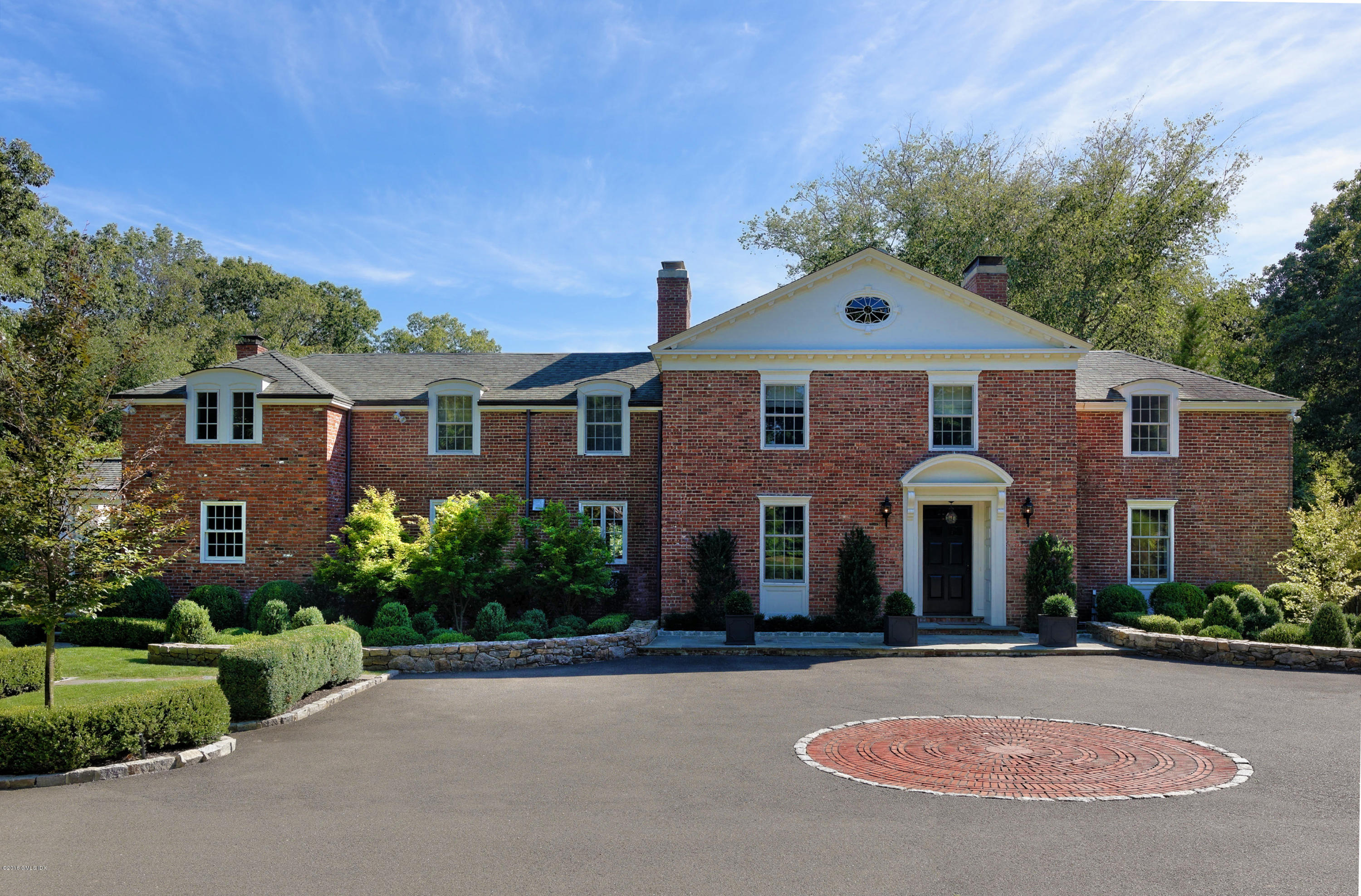 46 Quail Road Greenwich, CT 06831 - Photo 1 of 22 front view of a house with a yard