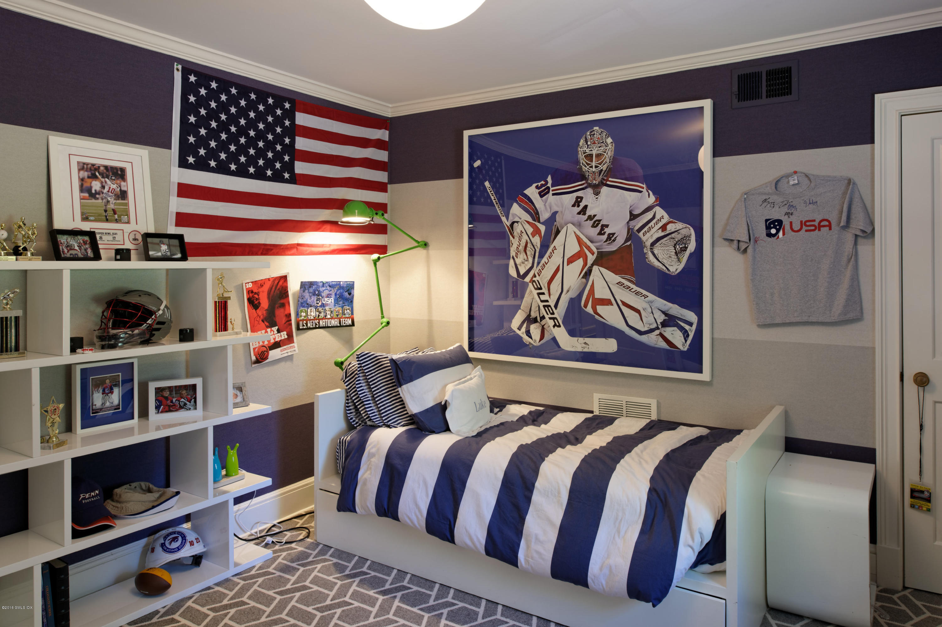 46 Quail Road Greenwich, CT 06831 - Photo 13 of 22 a bedroom with a bed and painting on the wall