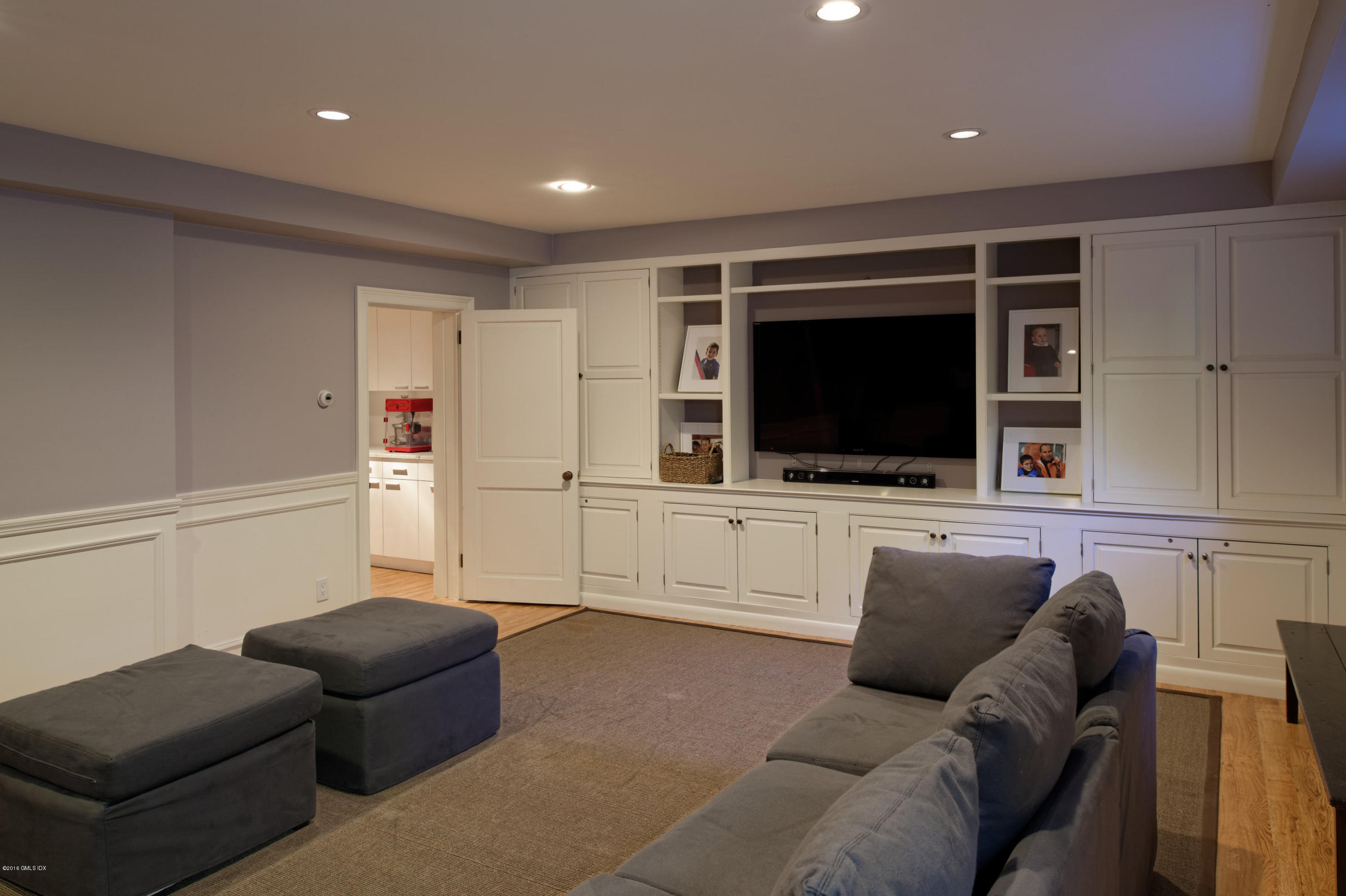 46 Quail Road Greenwich, CT 06831 - Photo 14 of 22 a living room with furniture and a flat screen tv