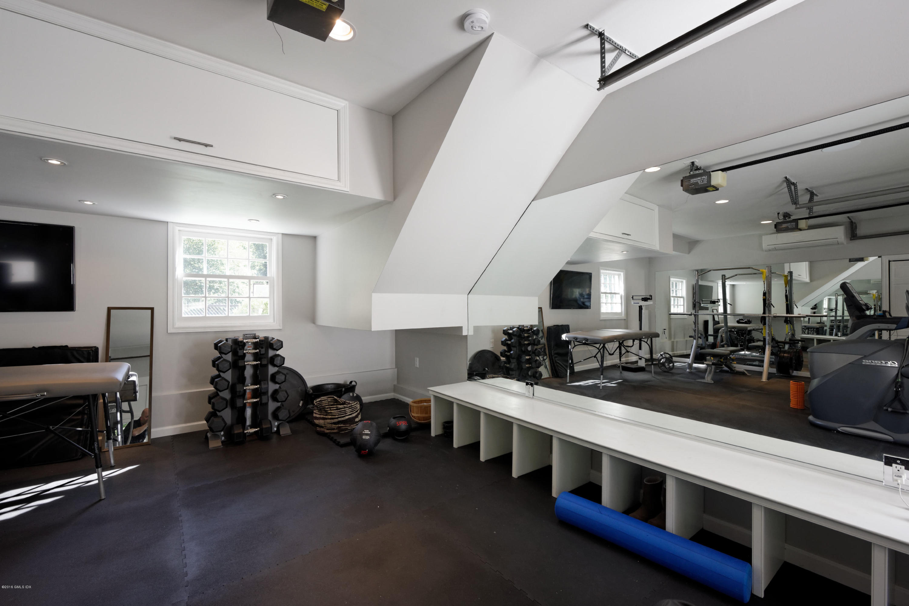 46 Quail Road Greenwich, CT 06831 - Photo 15 of 22 a very nice looking room with many windows and a ceiling fan