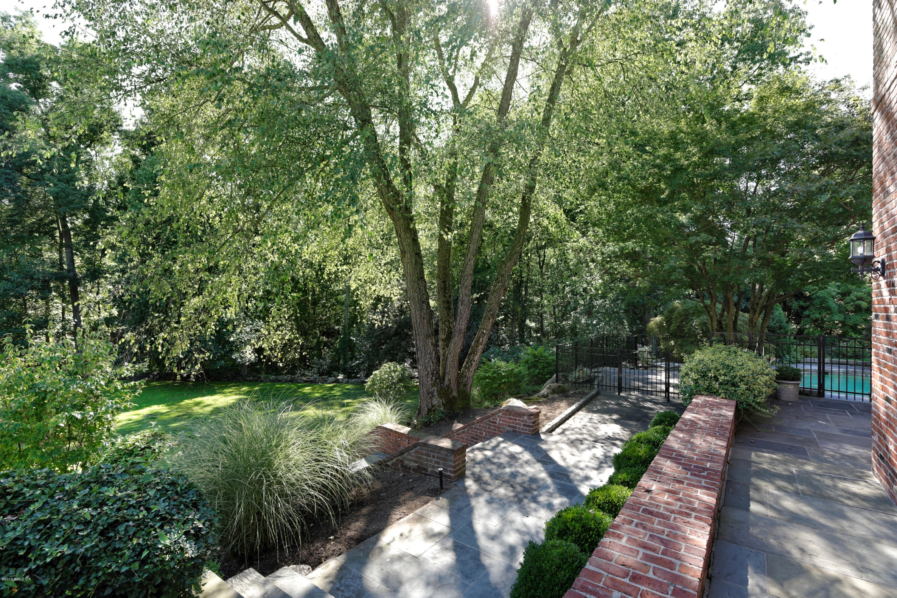 46 Quail Road Greenwich, CT 06831 - Photo 21 of 22 a view of an outdoor space with a lake view