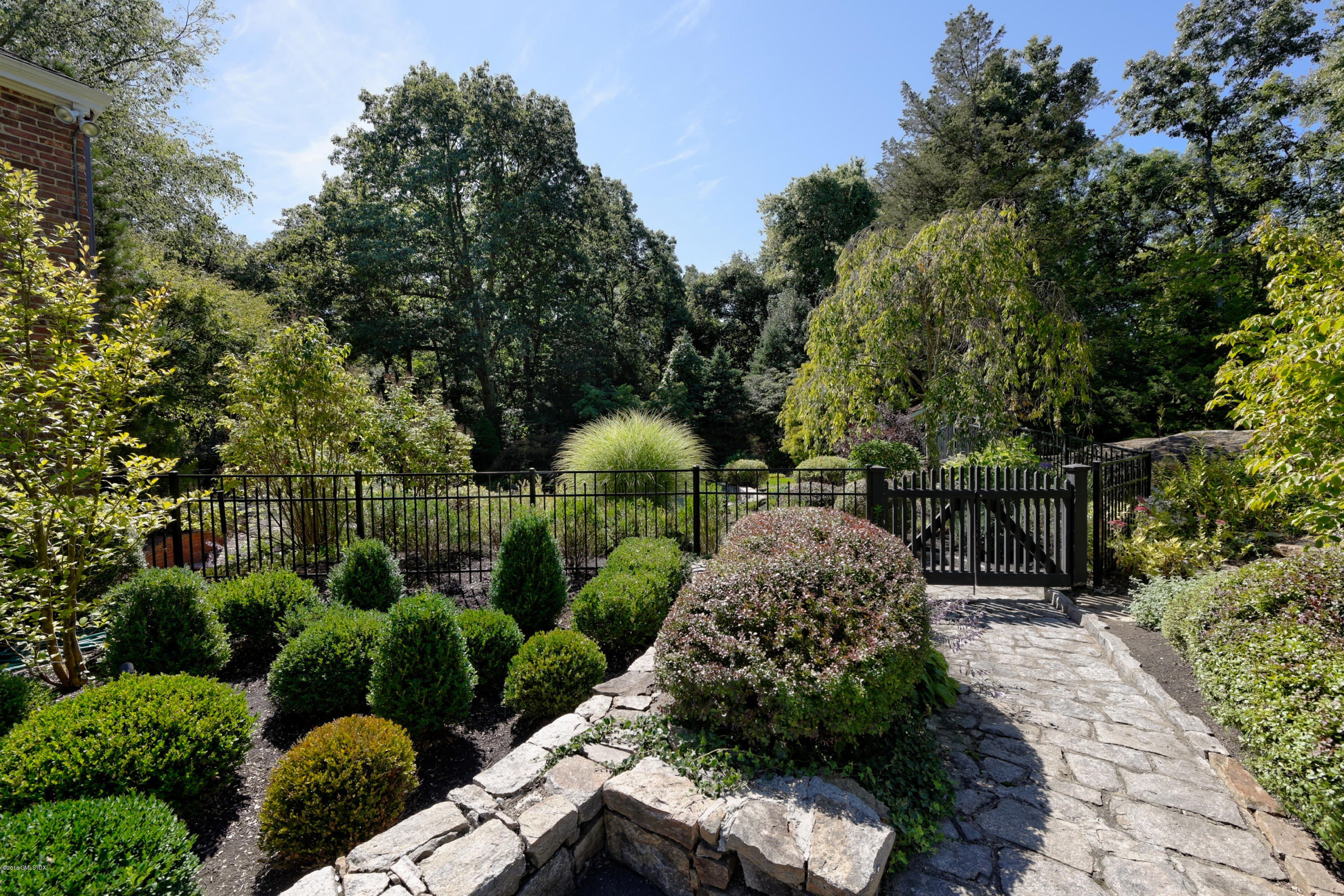 46 Quail Road Greenwich, CT 06831 - Photo 22 of 22 a view of a garden