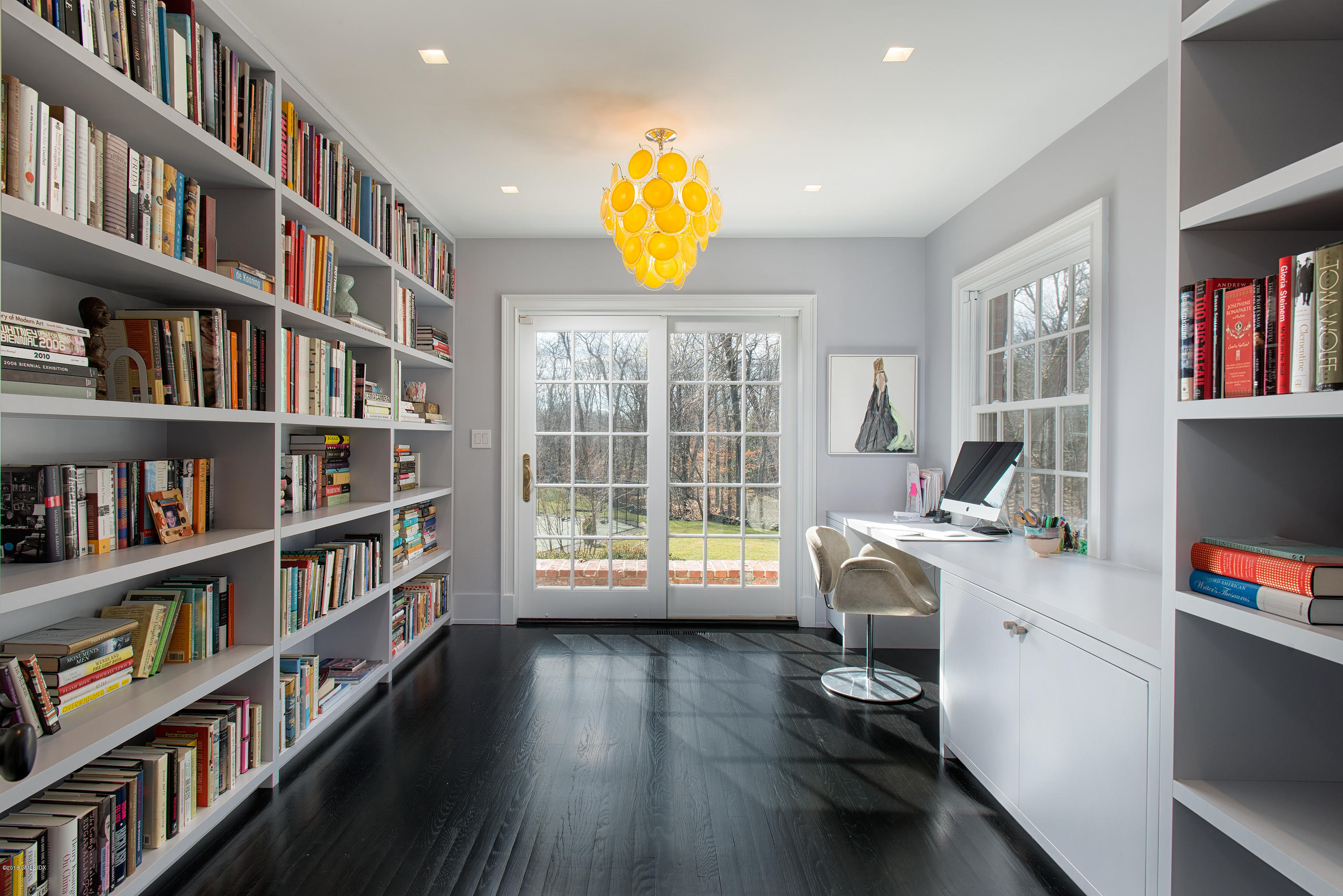 46 Quail Road Greenwich, CT 06831 - Photo 5 of 22 a workspace with a book shelf