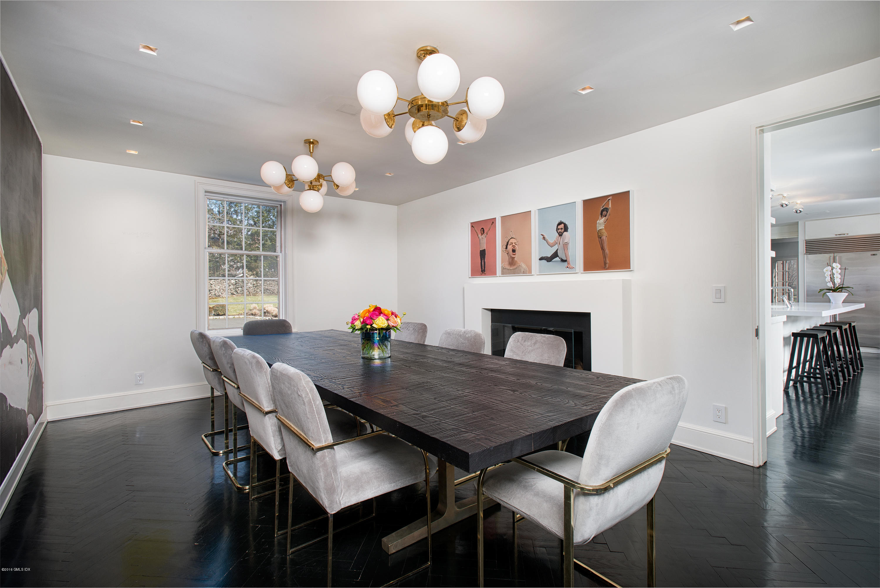 46 Quail Road Greenwich, CT 06831 - Photo 7 of 22 a view of a dining room with furniture and a chandelier