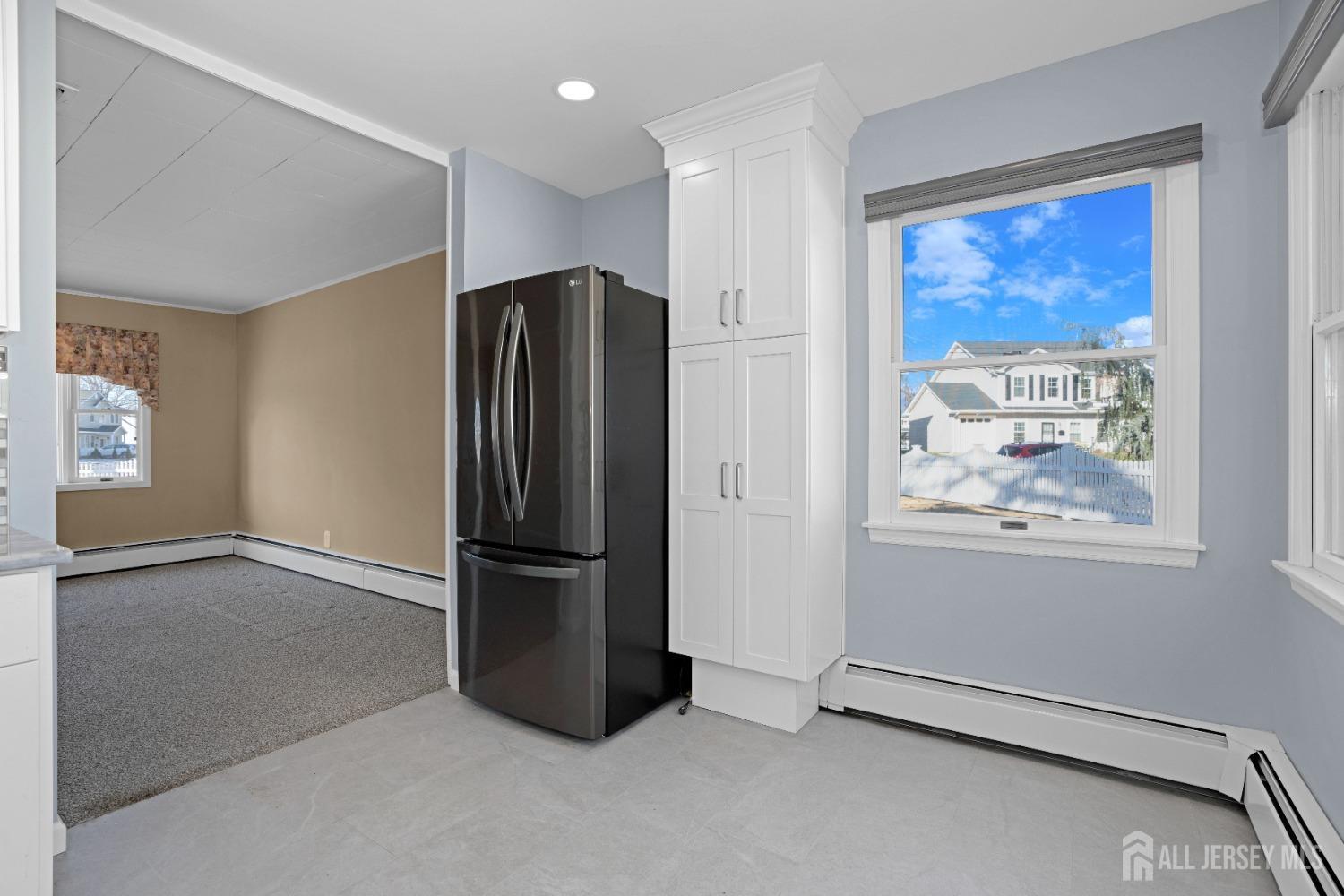 52 Markham Road Edison, NJ 08817 - Photo 12 of 28 an empty room with window and furniture