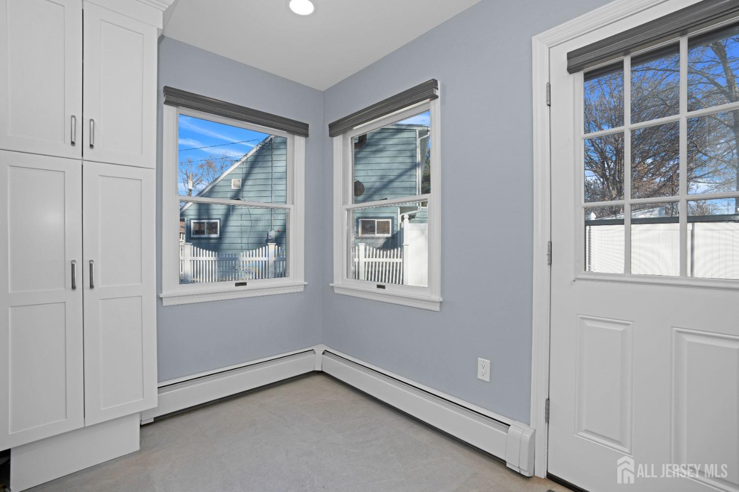 52 Markham Road Edison, NJ 08817 - Photo 13 of 28 a view of an empty room with a window