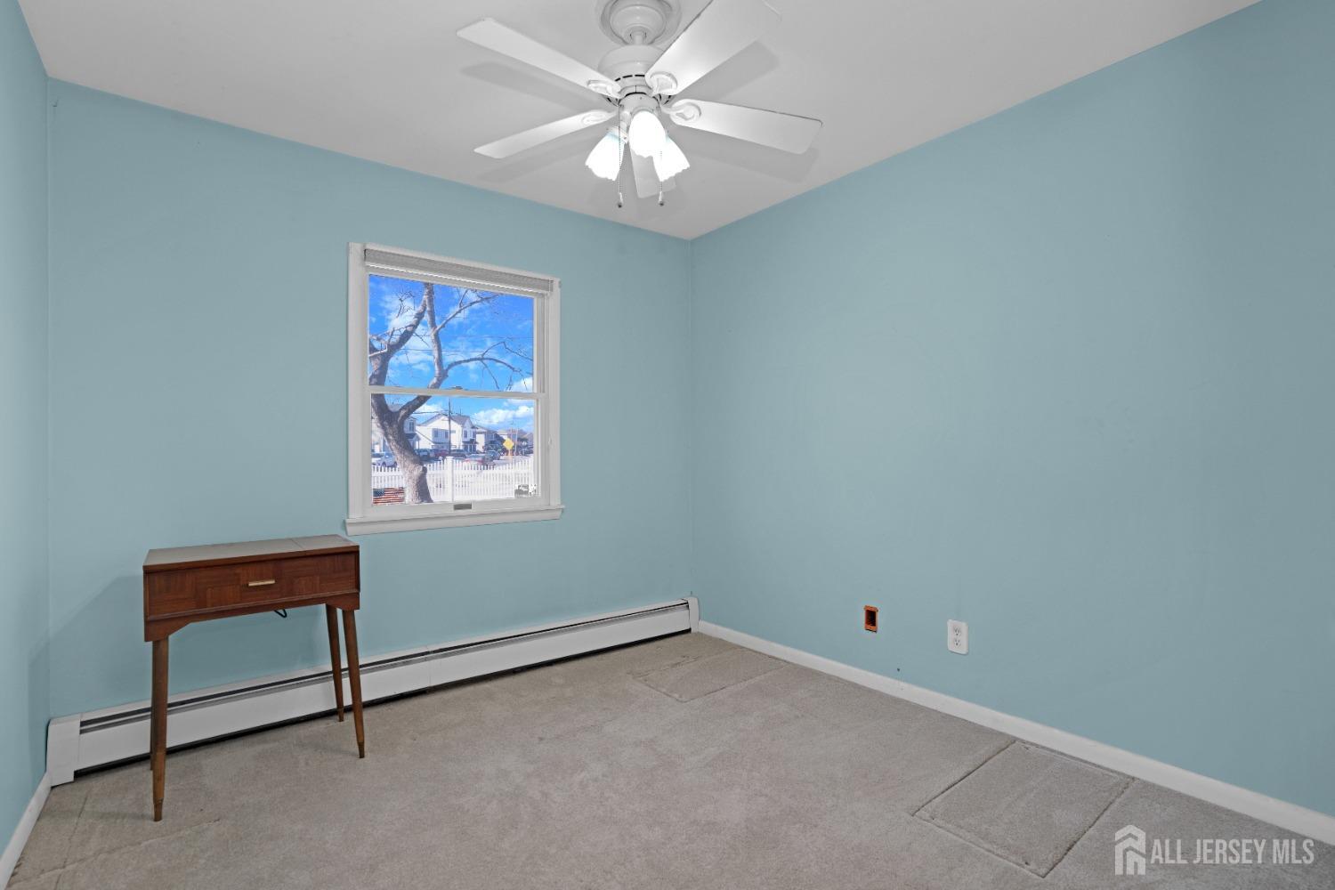52 Markham Road Edison, NJ 08817 - Photo 16 of 28 a view of an empty room with window