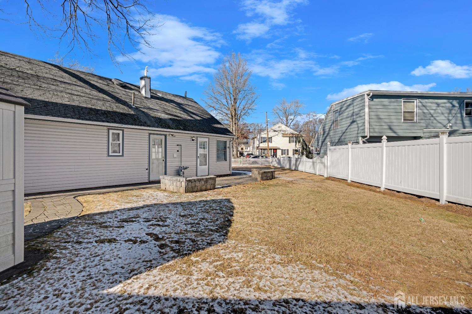 52 Markham Road Edison, NJ 08817 - Photo 23 of 28 a house view with a backyard space