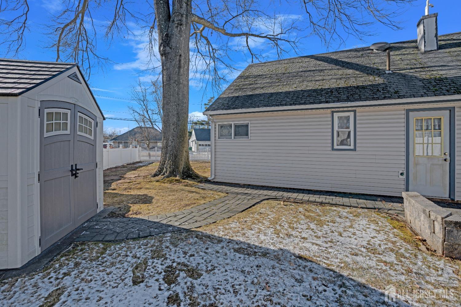 52 Markham Road Edison, NJ 08817 - Photo 25 of 28 a view of a house with a yard