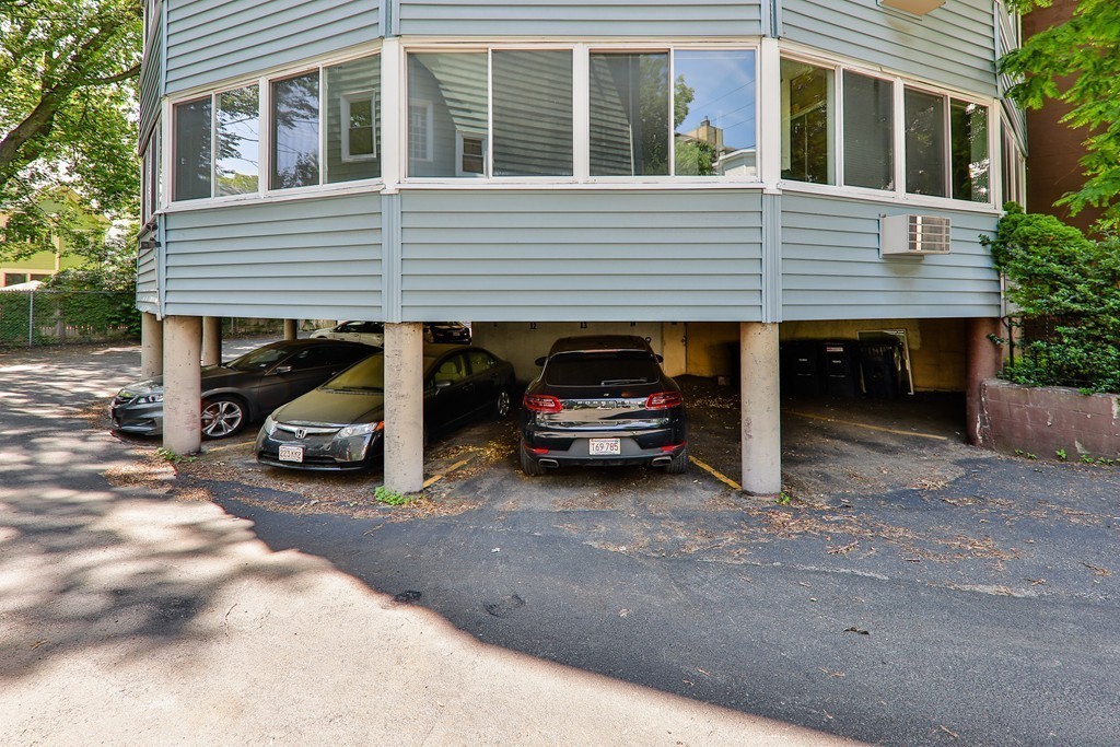 512-516 Green Street, Unit 1D Cambridge, MA 02139 - Photo 8 of 9 a view of a car parked in front of house