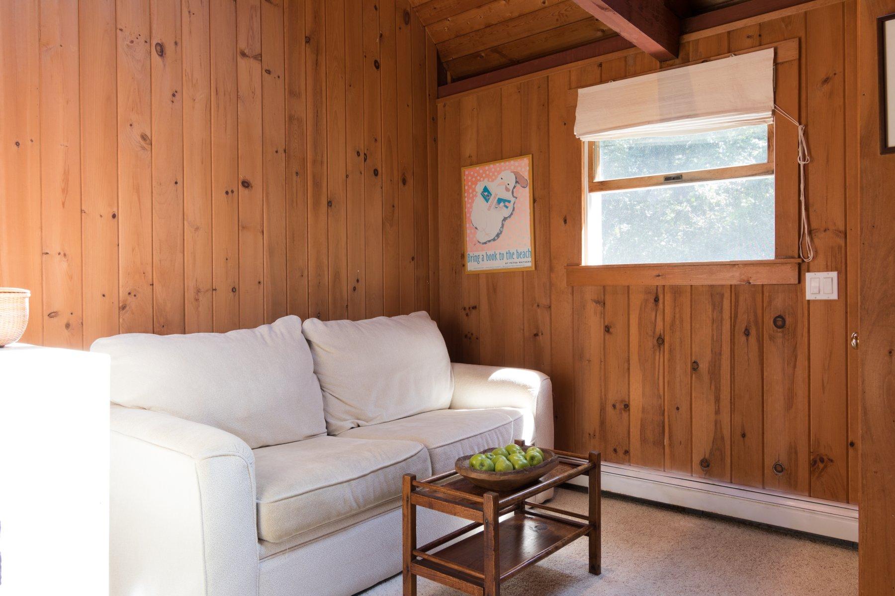 115 Cole Road Eastham, MA 02642 - Photo 21 of 33 a living room with furniture and a window
