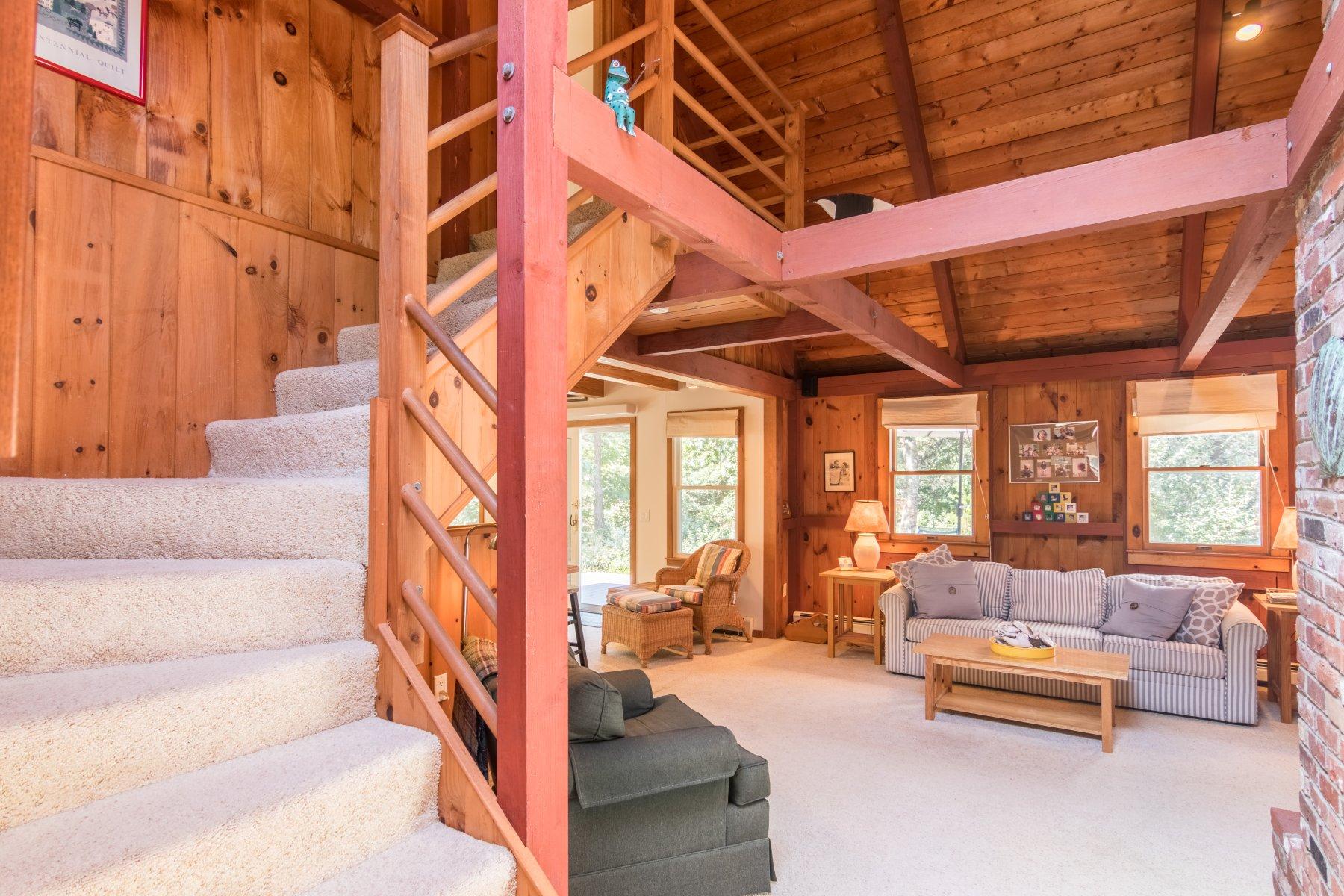115 Cole Road Eastham, MA 02642 - Photo 23 of 33 a living room with furniture and a large window