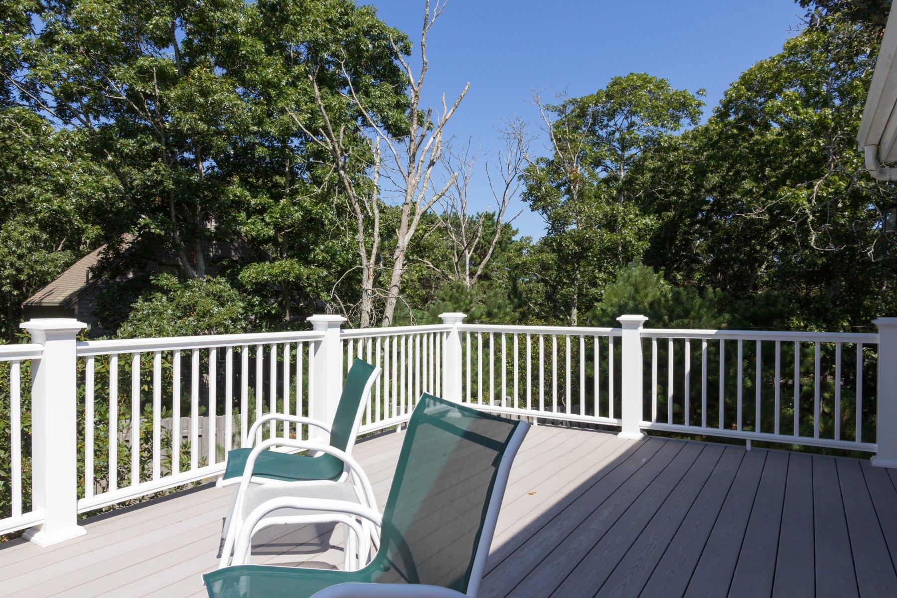 115 Cole Road Eastham, MA 02642 - Photo 33 of 33 a view of balcony with wooden floor and outdoor seating