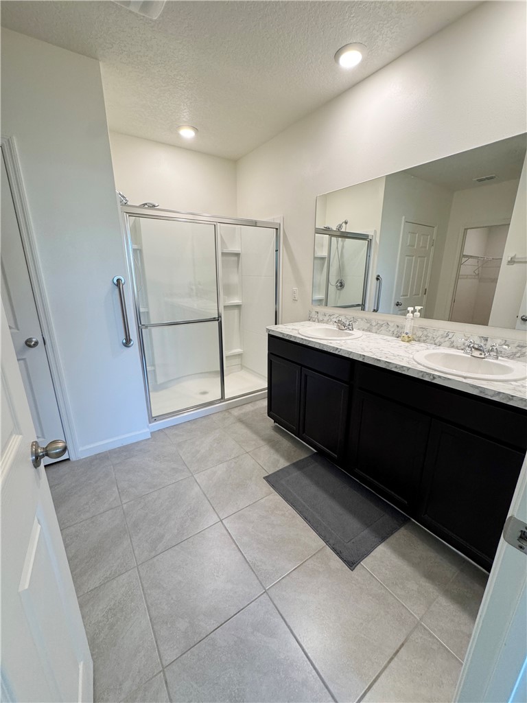 1836 Barber Street Sebastian, FL 32958 - Photo 25 of 29 a bathroom with a sink and mirror