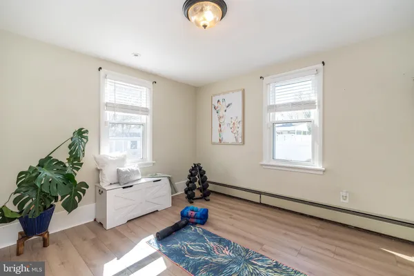 a bed room with furniture and a window