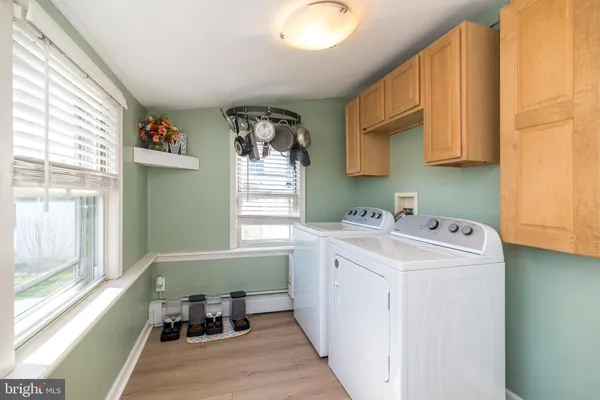 a utility room with dryer and washer