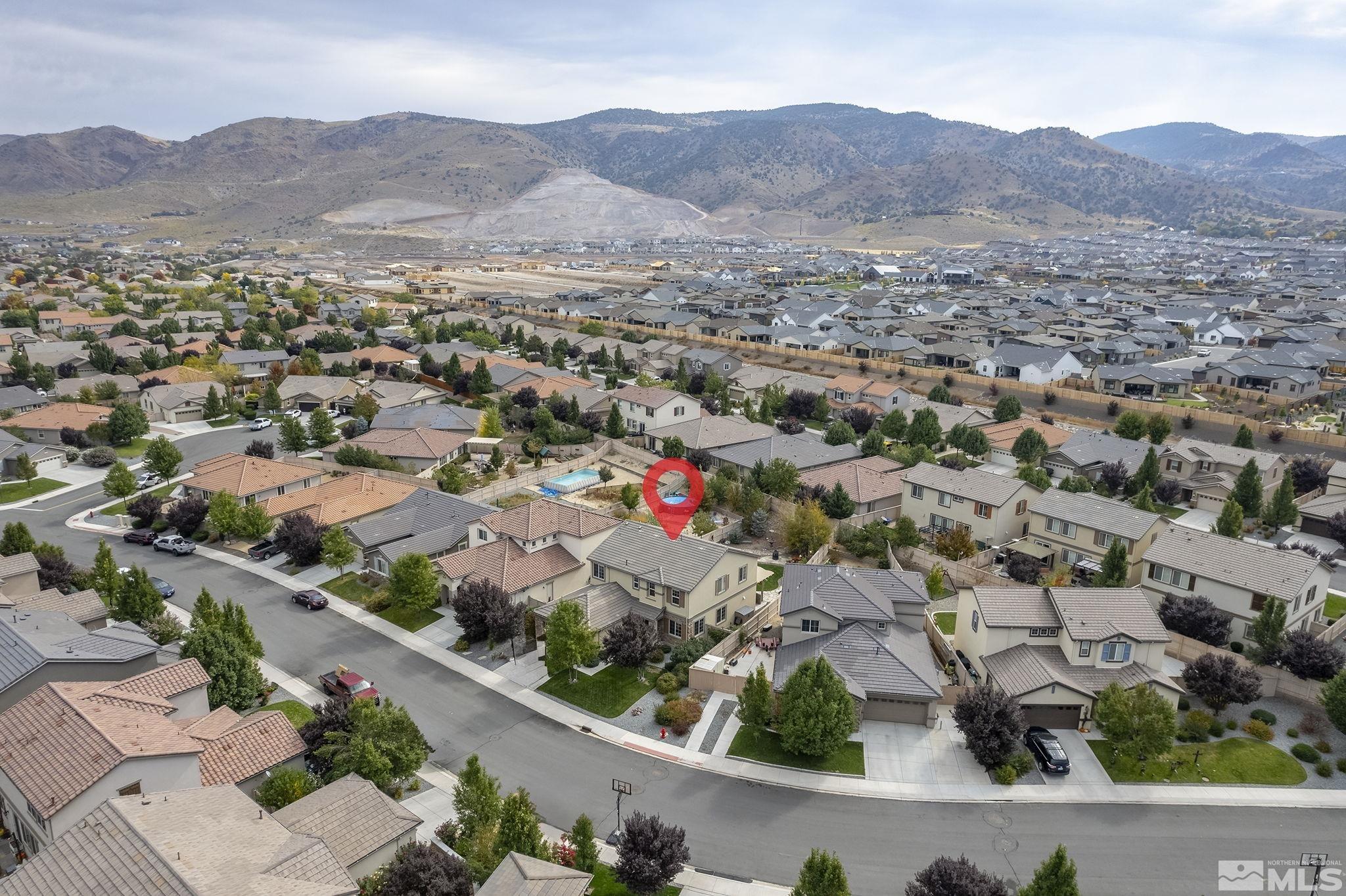 10848 Walnut Ridge Drive Reno, NV 89521 - Photo 30 of 32 an aerial view of residential house and green space