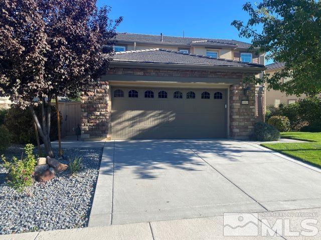 10848 Walnut Ridge Drive Reno, NV 89521 - Photo 3 of 32 a view of a house with a yard