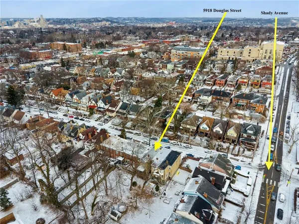 an aerial view of multiple house