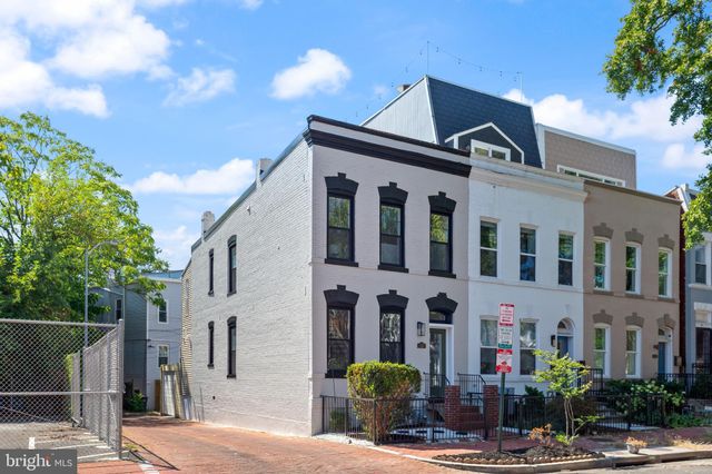 a front view of a building with street view