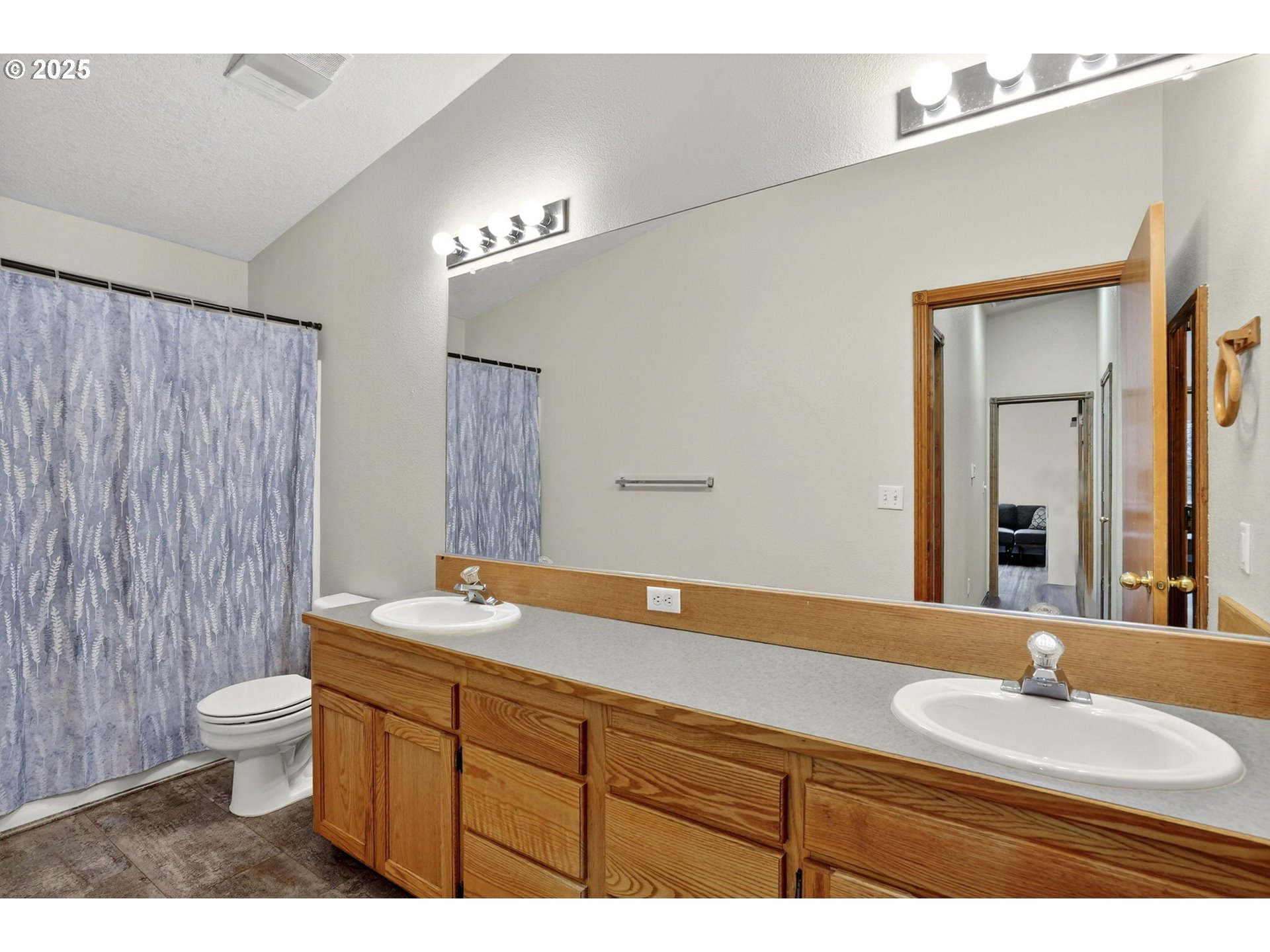 42101 Southeast Locksmith Lane Sandy, OR 97055 - Photo 15 of 48 a bathroom with a granite countertop sink and a mirror