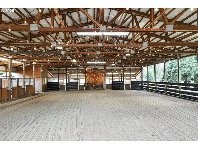a view of a room with wooden stairs