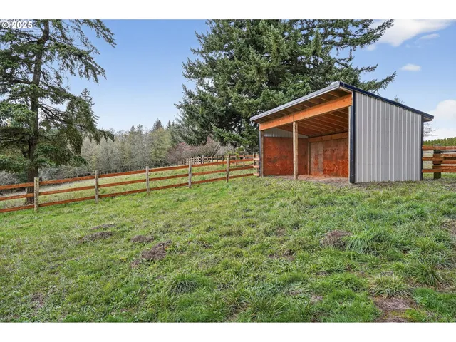a view of a water fountain and a big yard