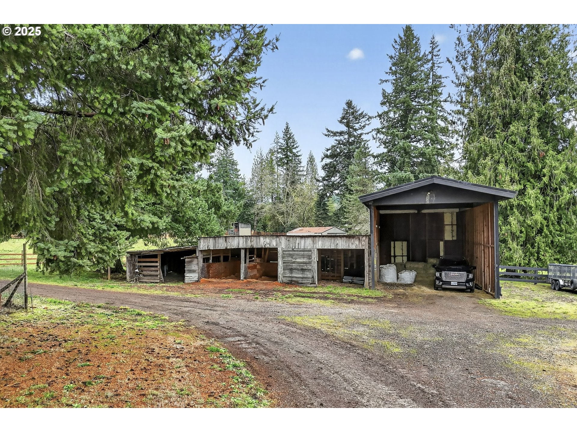 42101 Southeast Locksmith Lane Sandy, OR 97055 - Photo 41 of 48 a view of a house with a yard and sitting area