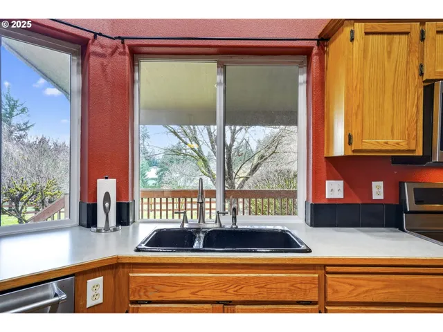 a view of a living room and window