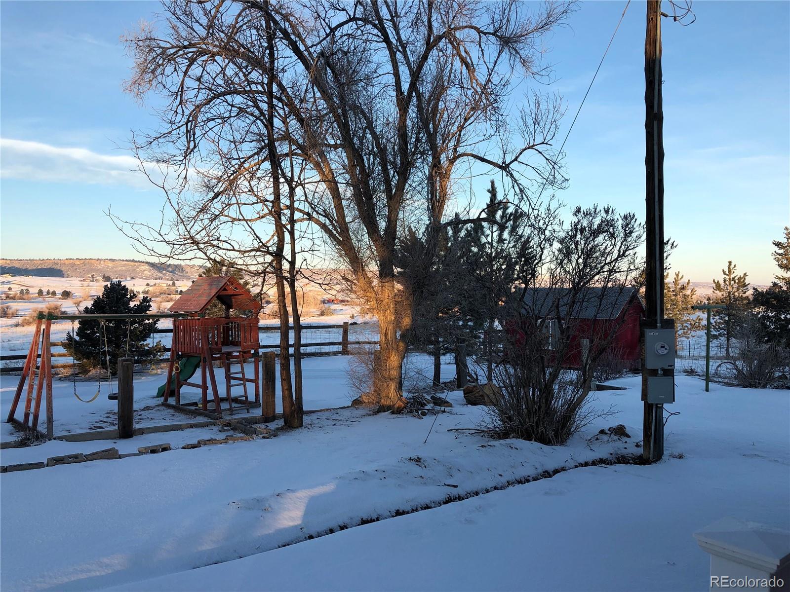 1671 North State Highway 83, Unit B Franktown, CO 80116 - Photo 17 of 21 a view of outdoor space with seating