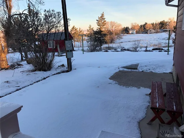 a view of a road with a building in the background