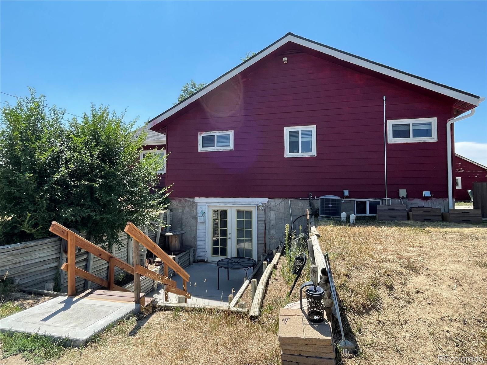 1671 North State Highway 83, Unit B Franktown, CO 80116 - Photo 21 of 21 a view of a house with backyard