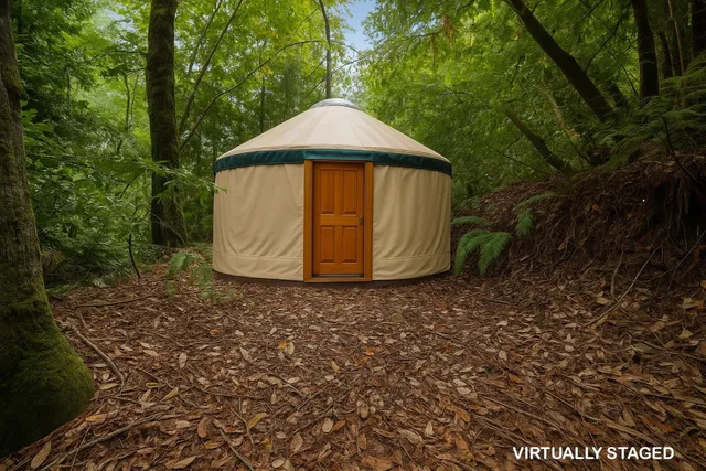 a view of a backyard of the house